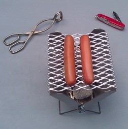 Compact, portable mini barbecue. Extremely lightweight. Great for hiking, camping, or picnics.