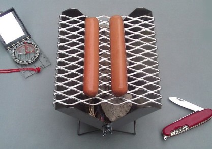Compact, mini portable barbecue. Extremely lightweight. Great for hiking, camping, picnics, or emergency and survival.